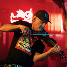 Musician playing at Fred’s Lounge in Mamou, Louisiana
