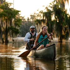 Canoers exploring Lake Martin near Lafayette, Louisiana